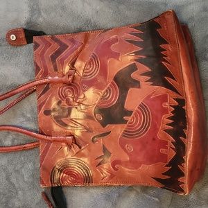 Beautiful leather handpainted purse used twice.